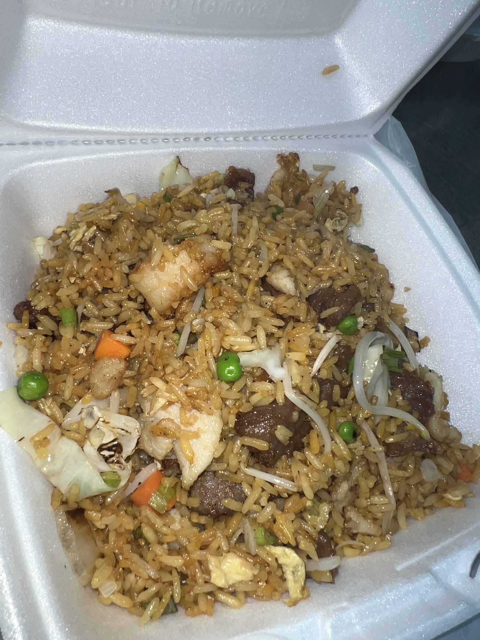 Fried rice with beef, chicken, egg and vegetables
